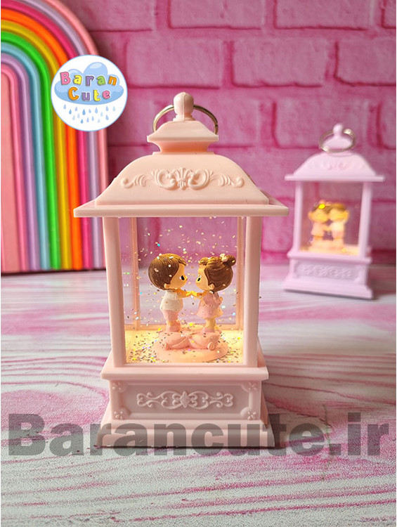 فانوس موزیکال چراغ دار طرح دختر و پسر صورتی