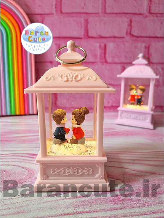 فانوس موزیکال چراغ دار طرح دختر و پسر نشسته