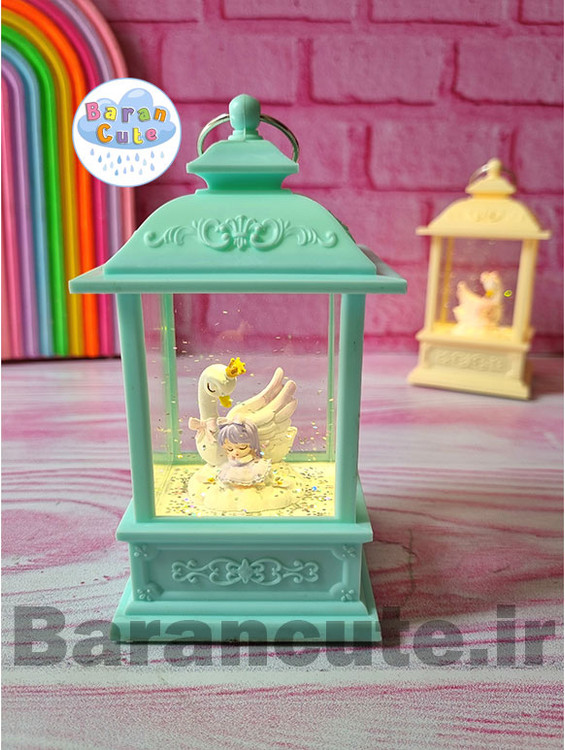 فانوس موزیکال چراغ دار طرح دختر و قو سبز پاستیلی
